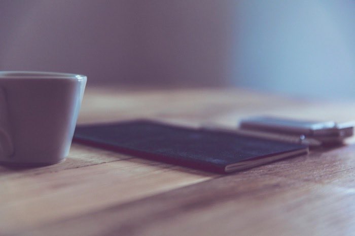 A notebook on a wooden table