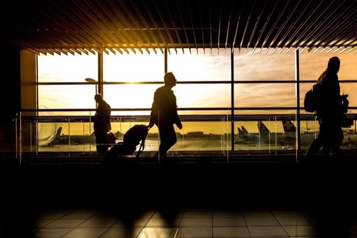 An airport terminal at sunset